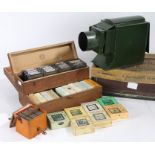 Butchers "Boys Own" magic lantern, housed in original box, together with three boxes of slides to