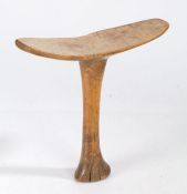 Somalian headrest, with sightly arched headrest, cylindrical column and spread foot, 34cm wide, 33cm