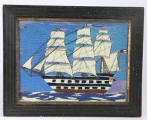 Early 20th century wool work study of a three masted sailing ship, housed in a wooden and glazed