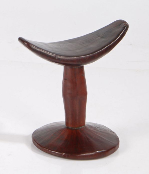 Shona tribal headrest, with curved platform and circular foot, 14cm wide, 14cm high