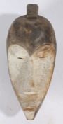 West African Fang mask, Gabon, carved hardwood with white painted face, 34cm long