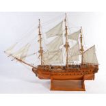 Wooden model of H.M.S. Superb, presented on a plinth base, 130cm high, 164cm long