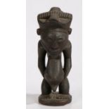 Carved wooden fertility figure possibly Luba people, Democratic republic of Congo, the stylised