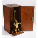 19th Century brass microscope by Baker, High Holborn, London, with polished brass body and