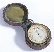 A pocket barometer by Dent, 33 Cockspur St, London, with silvered dial, 4.5cm diameter, housed in