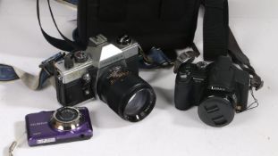 Praktica PM 3 camera, with 135mm lens, No. 138524, and a Panasonic Lumix digital camera (2)