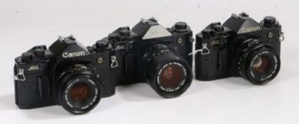 Three Canon A1 camera, with two 50mm lenes and a 28-55mm lens (3)