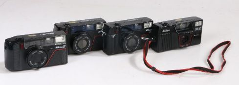 Nikon 35mm cameras to include two L35 AF 2,  AF3 and a L135 AF (4)