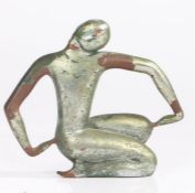In the manner of Henry Moore, a stylised bronze figure with chromed finish, modelled in a kneeling