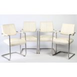 A set of 4 Xooon leather and chrome chairs in white. 86cm tall.