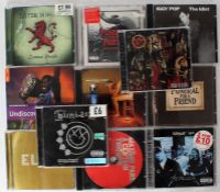 A collection of CDs to include Slayer - Reign In Blood (88697128822) / Metallica - Garage Inc. (