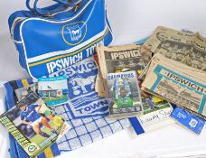 Ipswich Town blue leather bag, together with a collection of Ipswich Town programmes, to include Ron