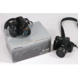 Pentax K-30 digital SLR camera, with original box, Canon Coolpix P600 digital camera (2)