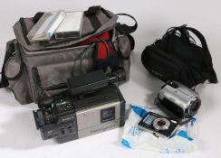 Sony Digital Video Camera Recorder, and a Sony Digital Handycam, each with carrying bags (2)