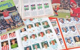 Collection of football sticker and picture card albums with signatures, to include Panini's '83