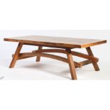 Contemporary applewood coffee table, by Revival Oak of Devon, with planked top and cleated ends,