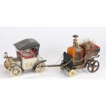 Two novelty decanter sets, one in the form of a car, the other a musical carriage (2)