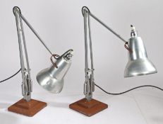 A pair of Herbert Terry & Sons Ltd. Redditch angle poise lamps. 95cm tall when fully extended.