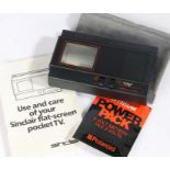 Sinclair flat-screen pocket TV, with instruction manual and slip case