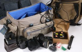 Collection of camera accessories, to include carrying bags, Konica flash unit and Cobra D400 flash
