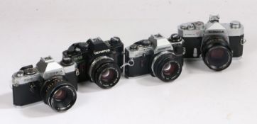 Cameras to include Olympus OM 10, Olympus OM 40, Konica Autoreflex T, Yasmica FK-D all with 50mm
