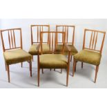 A set of five Gordon Russell upholstered dining chairs (one carver and four singles).