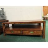 A mid-century hardwood rectangular coffee table with two draws, together with another square example