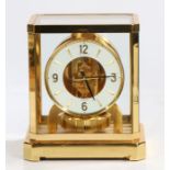 Jaeger-Le-Coultre Atmos clock, having a brass and five glass case, with white chapter ring and