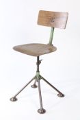 Mid 20th century plywood and steel industrial swivel chair, 87cm tall.