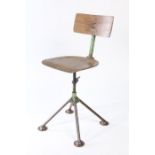 Mid 20th century plywood and steel industrial swivel chair, 87cm tall.