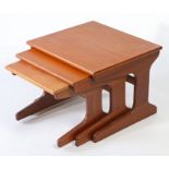 Teak nest of three tables. The largest measuring 54cm x 48cm x 41cm.