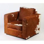 Joris cowhide chair in the Art Deco manner. 86cm x 86cm x 75cm