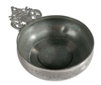 A George III pewter porringer, Bristol, circa 1770 Having a bellied bowl, bossed base, and coronet