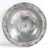 A rare Henry VII pewter bumpy-bottom dish, circa 1490 or possibly earlier Having a plain rim with