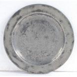 A rare William & Mary/Queen Anne small pewter plate/paten, circa 1700-10 Having a plain rim and flat