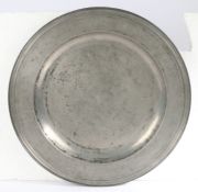 An impressive, large, William & Mary pewter multi-reeded charger, circa 1700 The rim engraved 'T.
