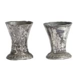 A near pair of pewter miniature beakers, circa 1600 Each with slender flared drum, on a spreading