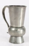 A pewter thistle-shaped measure, Scottish Imperial half-pint, with off-set handle and tall foot rim,