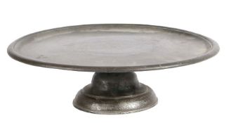 A rare Queen Anne pewter footed plate or tazza, circa 1710 The flat circular plate with reeded and