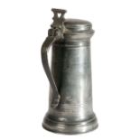 A small Charles I pewter flagon, circa 1640 The tapering drum with moulding and milling to rim and