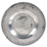 A rare early 17th century pewter punched-decorated broad rim dish, English. circa 1620-40 The reeded