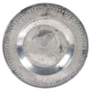 A rare early 17th century pewter punched-decorated broad rim dish, English. circa 1620-40 The reeded