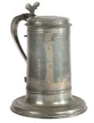 An unusual Charles II pewter Beefeater flagon, circa 1680 Having a particularly wide shirt, topped