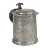 A William & Mary pewter flat-lid wrigglework tankard, circa 1690 The drum designed with three