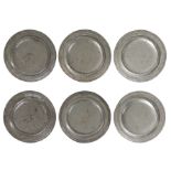 A rare set of six William & Mary/Queen Anne pewter narrow and multi-reeded rim plates, circa 1690-