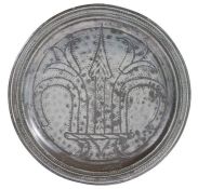 A fine William & Mary pewter narrow-rim, wrigglework, and all-over hammered plate, circa 1700 The