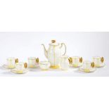 An Aynsley Art Deco butterfly and leaf moulded coffee set, pattern B1322, the handles modelled as