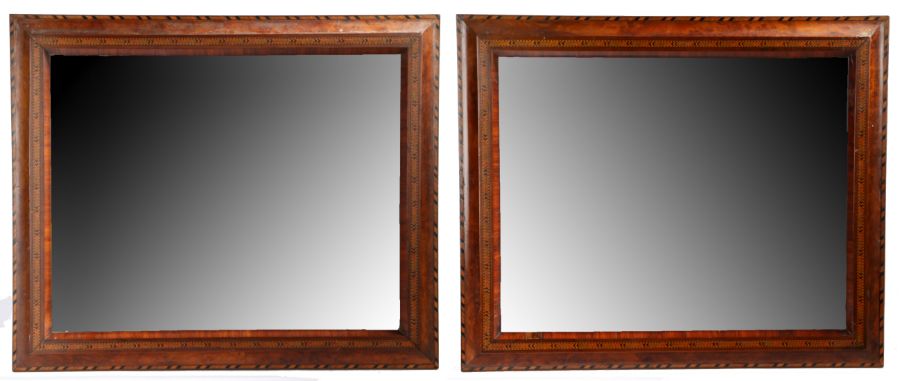 A pair of Victorian walnut and Tunbridge marquetry inlaid wall mirrors, the bevelled mirror plates