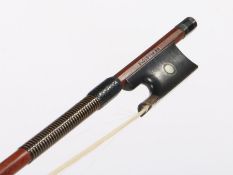 A white metal mounted violin bow, stamped W.E. Hill & Sons, with ebony frog and Parisian eye,