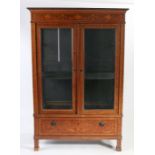 A 19th Century Dutch marquetry inlaid display cabinet, the acanthus leaf swept pediment above a